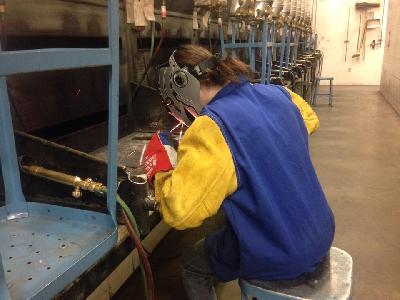 LCC student Sara Evans, 17, practices welding during lab time