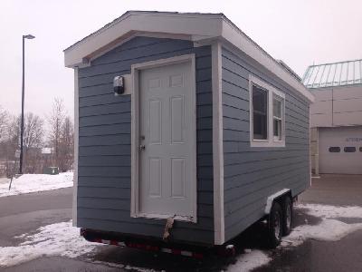 A model solar home sits outside at LCC's West Campus
