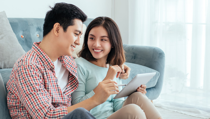 couple with tablet